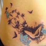tatuagens femininas na barriga