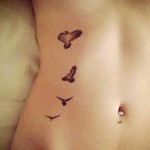 tatuagens femininas na barriga
