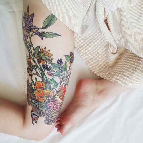 tatuagens femininas na coxa